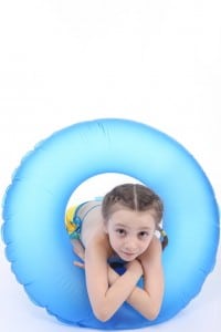 girl with swimming floatie